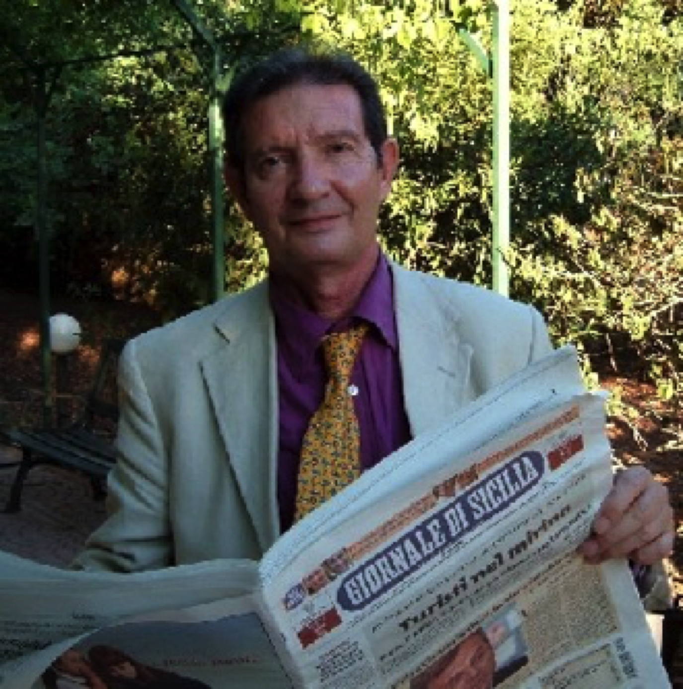 Carlo Puleo with newspaper